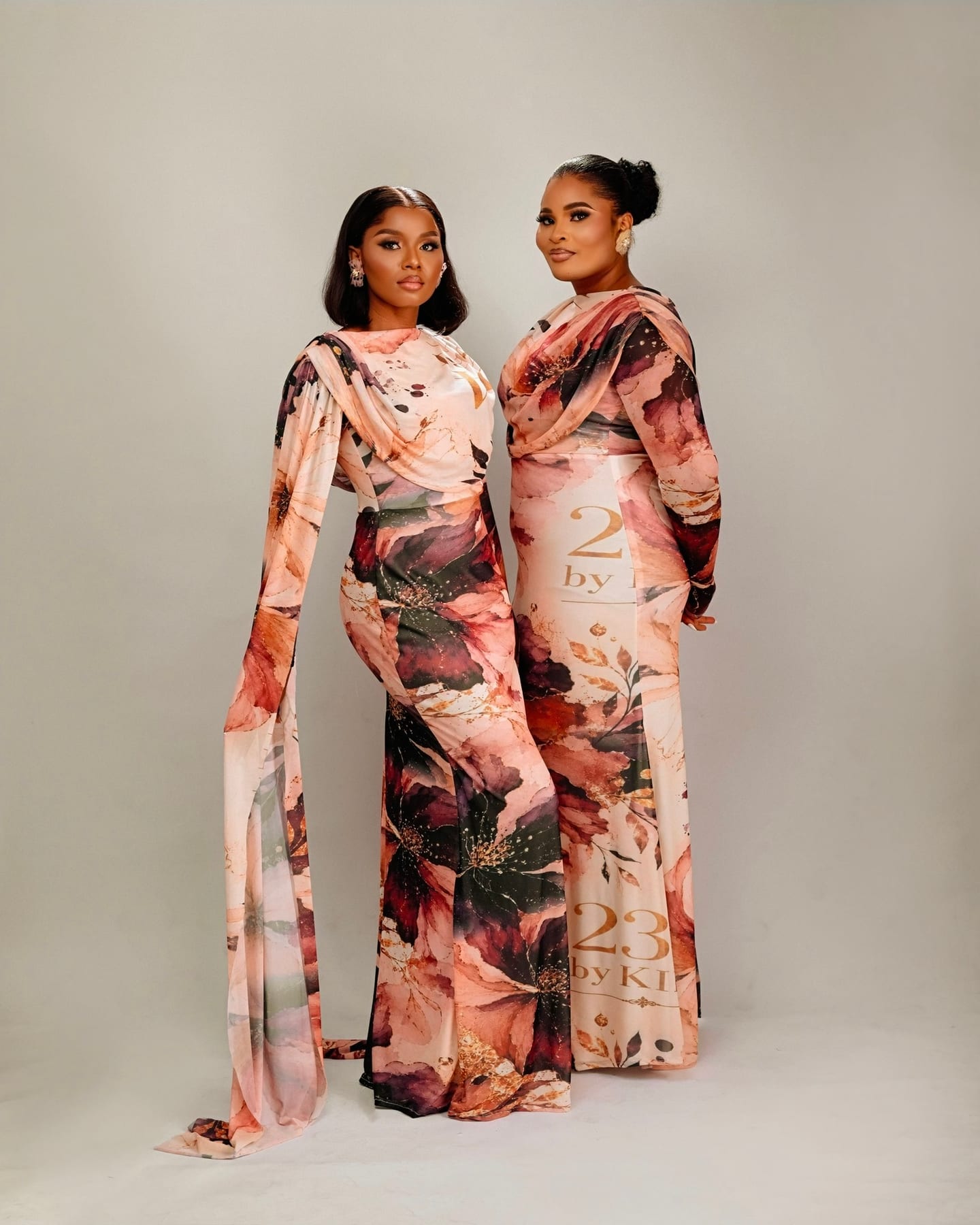 Regal Veil pink floral gown with trailing veil panels (frame 1 of 9)